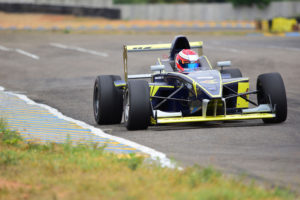 With sight set on the chequered flag racer breezes on his towards the finish line in Round 1 of the 19th JK Tyre FMSCI National Racing Championship
